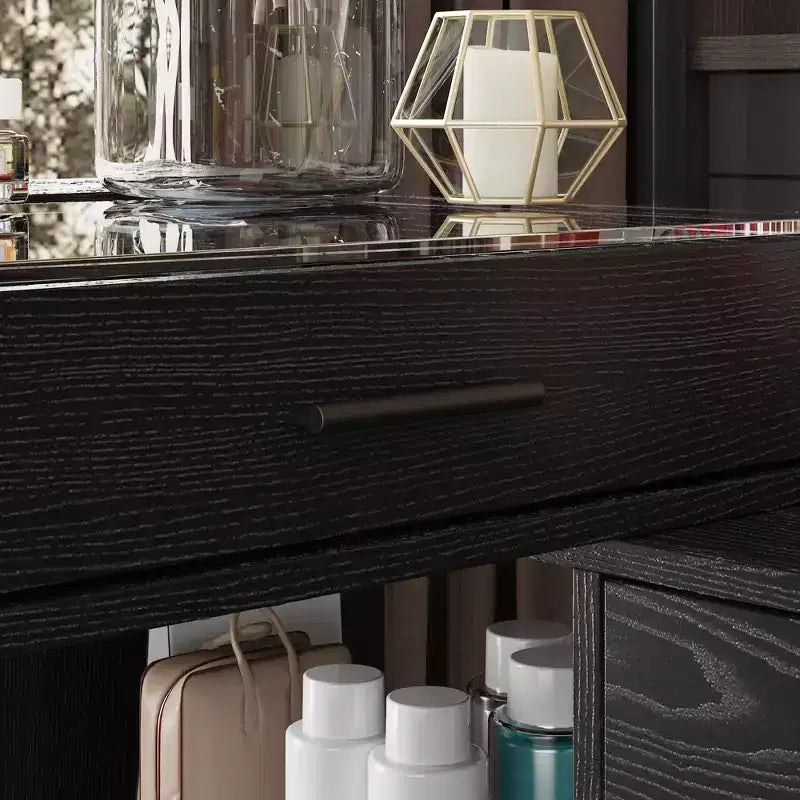 Tocador moderno esquinero en forma de L, escritorio de maquillaje con superficie de vidrio templado negro, 5 cajones y estantes abiertos, para el dormitorio
